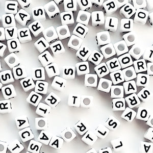 close up view of 6mm White Cube Alphabet beads 6mm