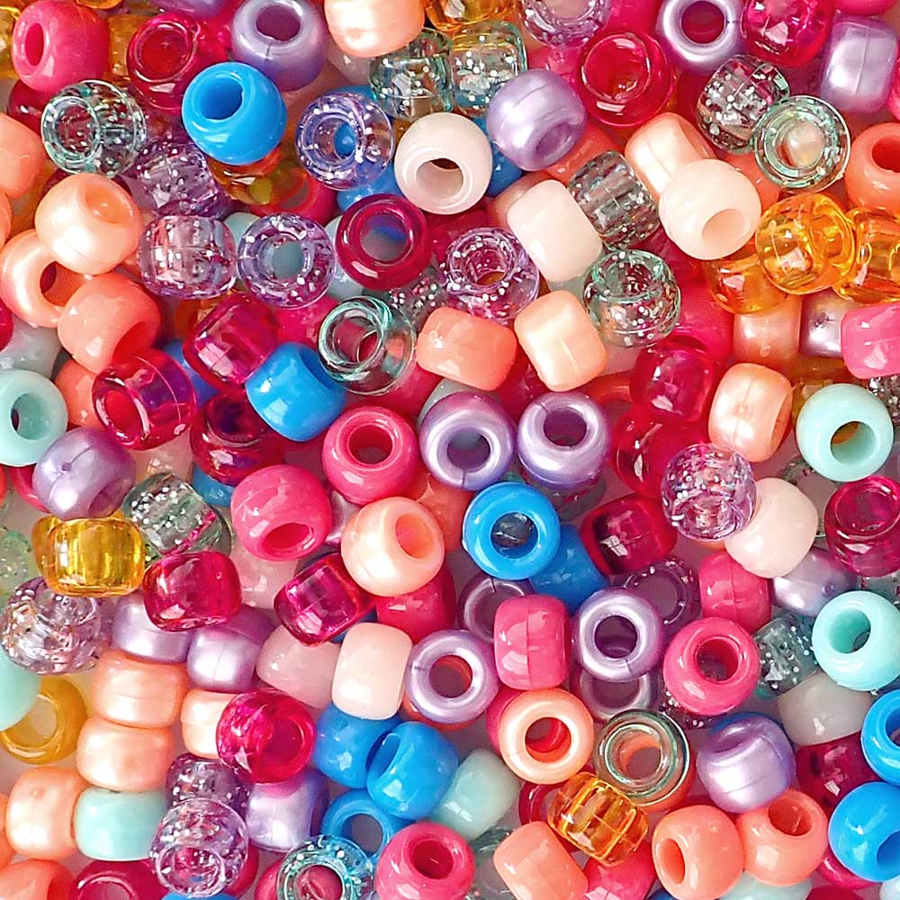 mixed colors of pony beads in a beach party color scheme