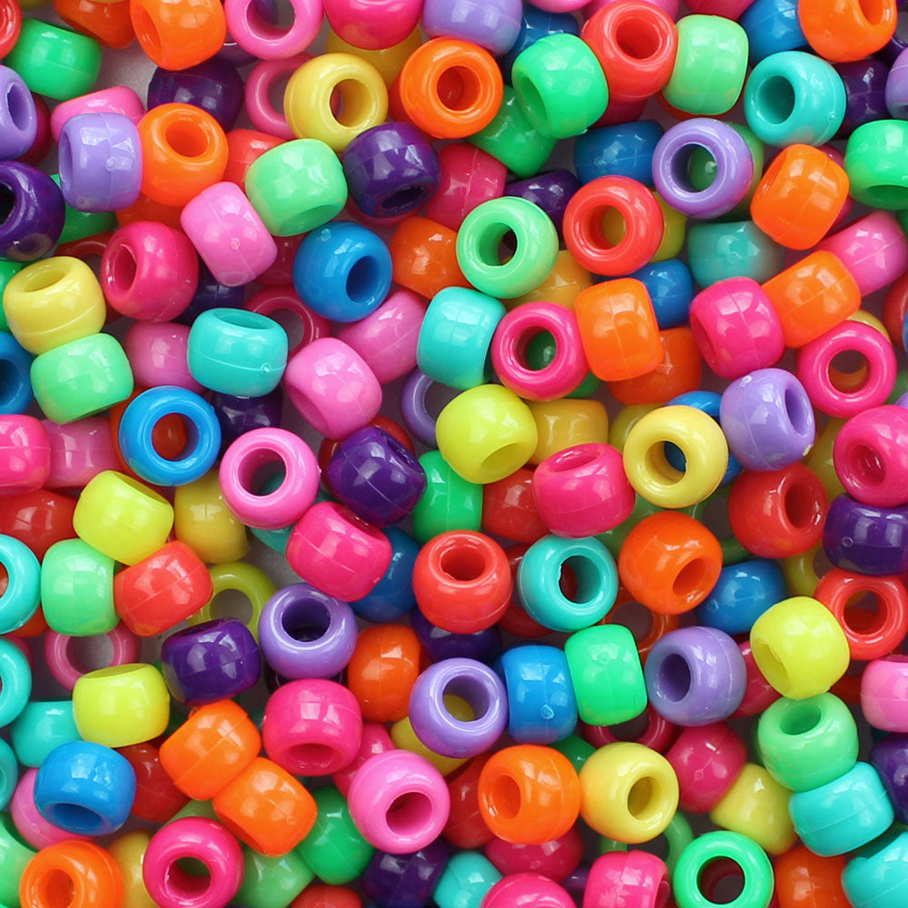 a mix of pony beads in assorted bright colors