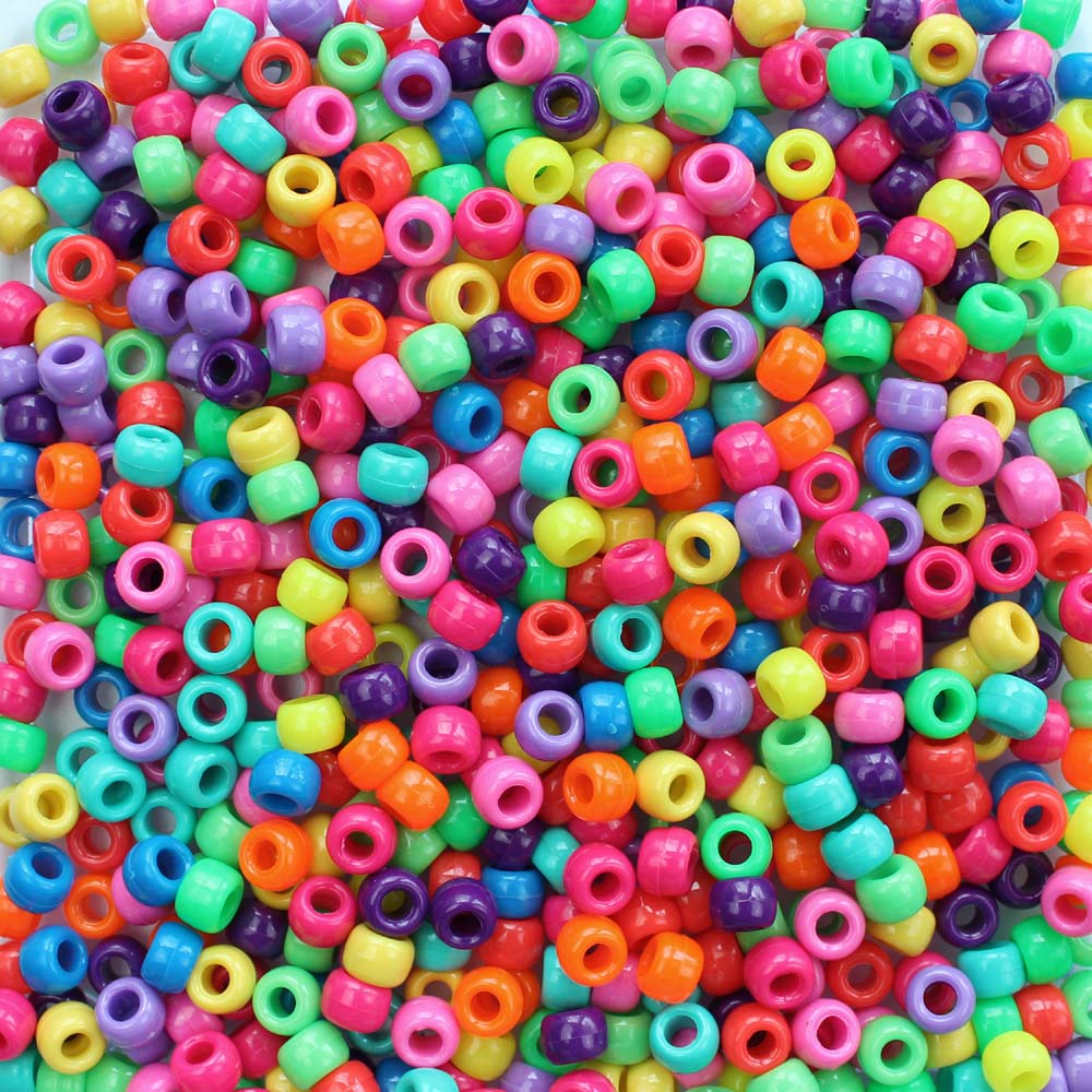 a mix of pony beads in assorted bright colors